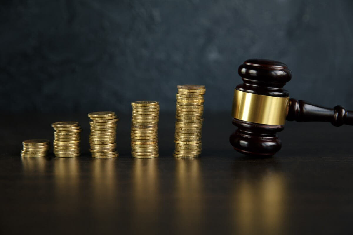 Judge gavel and gold coins